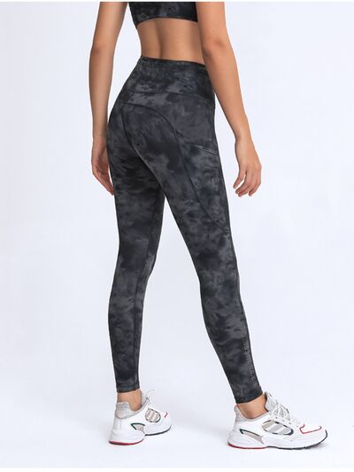 Double Take Wide Waistband Leggings with Pockets - Premium from Trendsi - Just $38! Shop now at ZLA