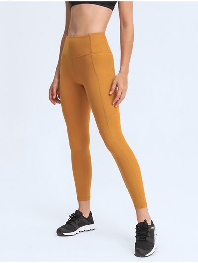 Double Take Wide Waistband Leggings with Pockets - Premium from Trendsi - Just $38! Shop now at ZLA