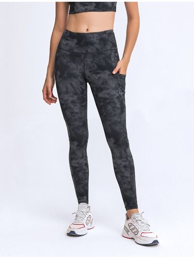 Double Take Wide Waistband Leggings with Pockets - Premium from Trendsi - Just $38! Shop now at ZLA