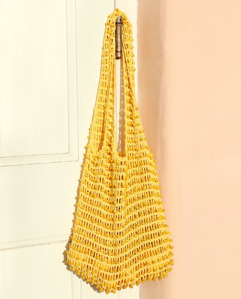Karma Wooden Beads Crochet Bag in Pale Yellow - Premium from BrunnaCo - Just $64.50! Shop now at ZLA