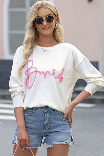 Letter Graphic Round Neck Sweater - Premium from Trendsi - Just $41! Shop now at ZLA