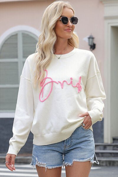 Letter Graphic Round Neck Sweater - Premium from Trendsi - Just $41! Shop now at ZLA