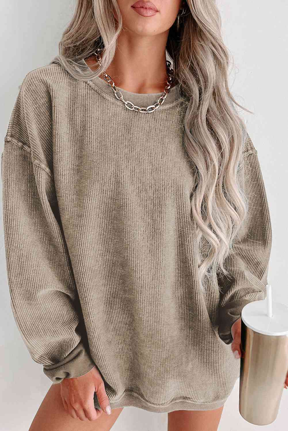 Round Neck Dropped Shoulder Sweatshirt - Premium from Trendsi - Just $39! Shop now at ZLA