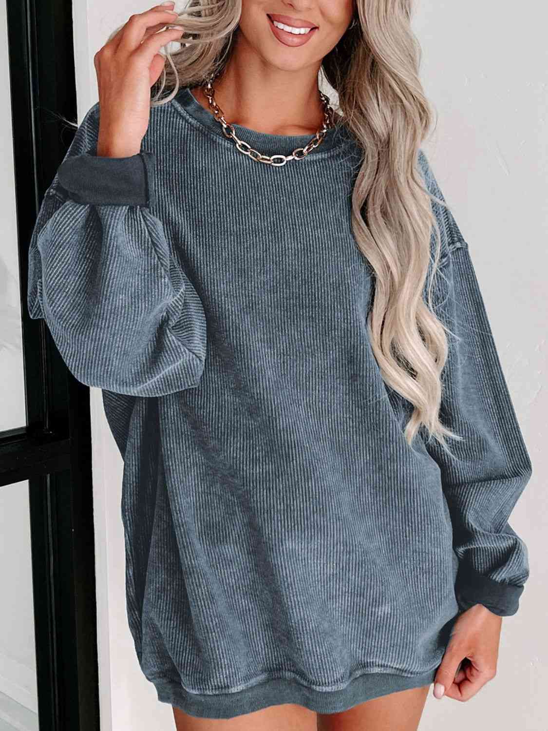 Round Neck Dropped Shoulder Sweatshirt - Premium from Trendsi - Just $39! Shop now at ZLA