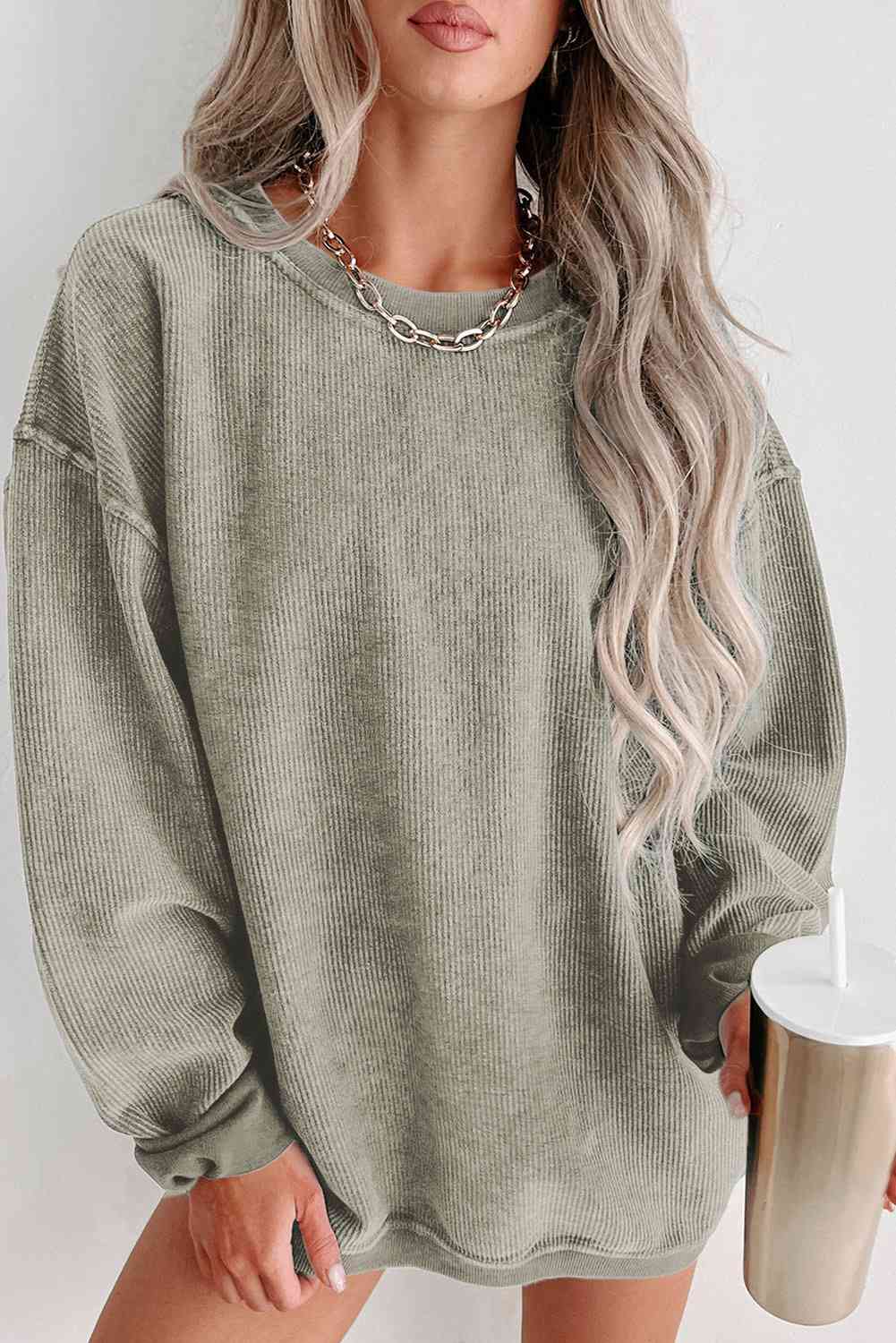 Round Neck Dropped Shoulder Sweatshirt - Premium from Trendsi - Just $39! Shop now at ZLA