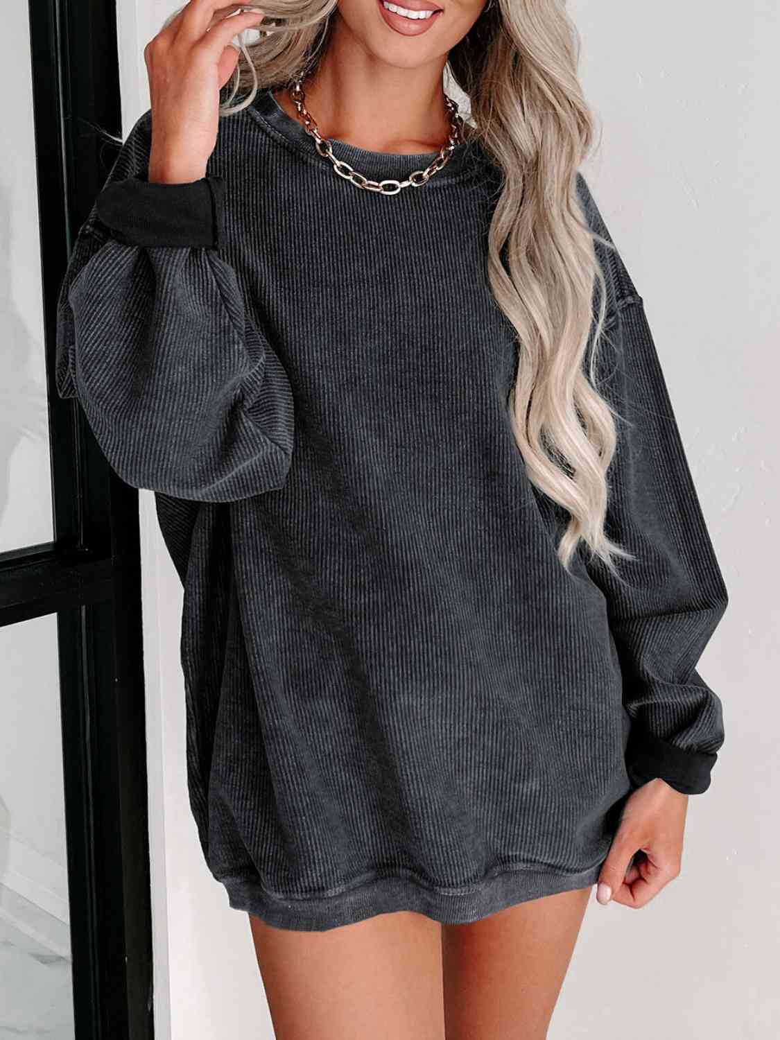 Round Neck Dropped Shoulder Sweatshirt - Premium from Trendsi - Just $39! Shop now at ZLA