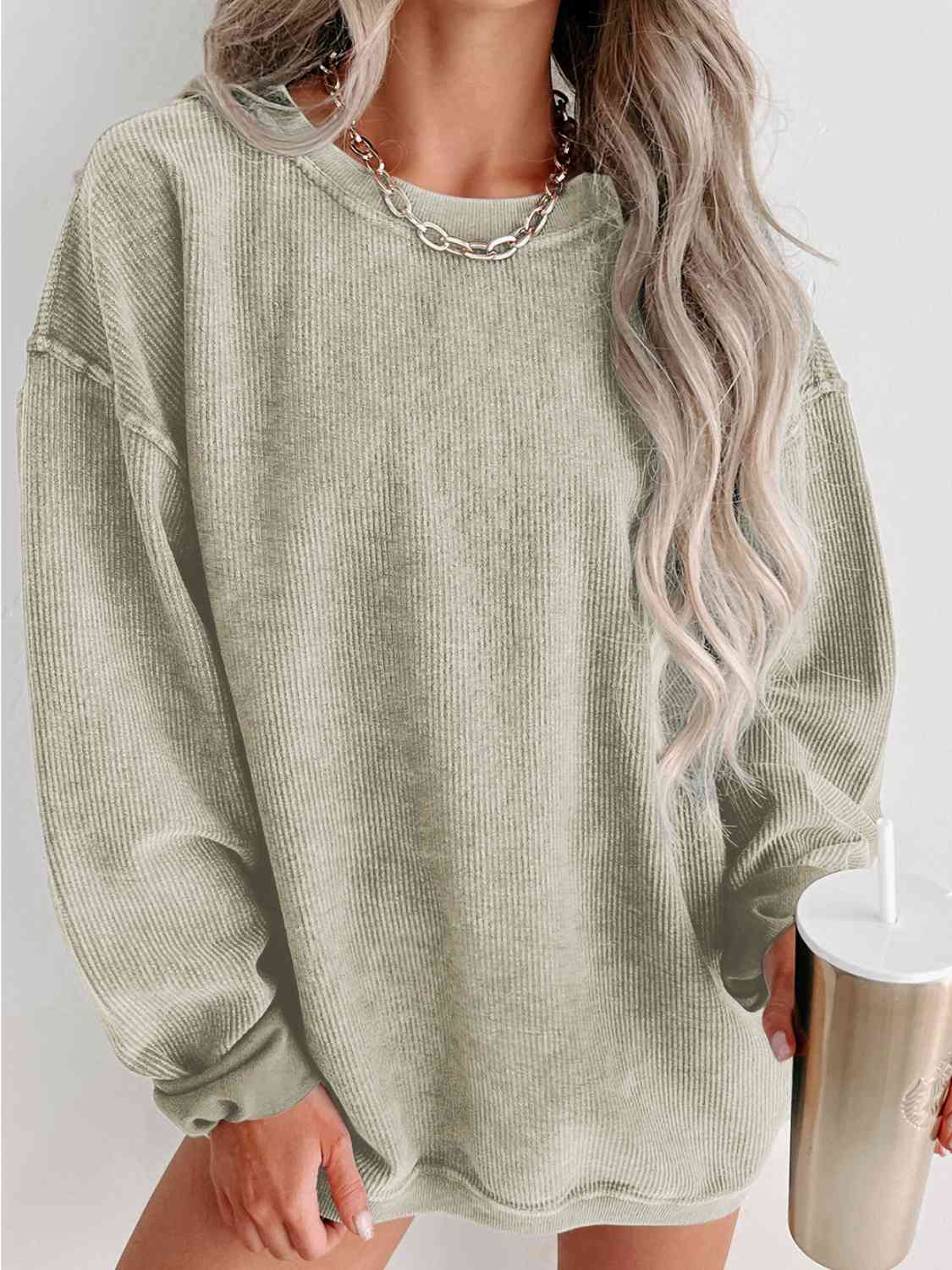 Round Neck Dropped Shoulder Sweatshirt - Premium from Trendsi - Just $39! Shop now at ZLA