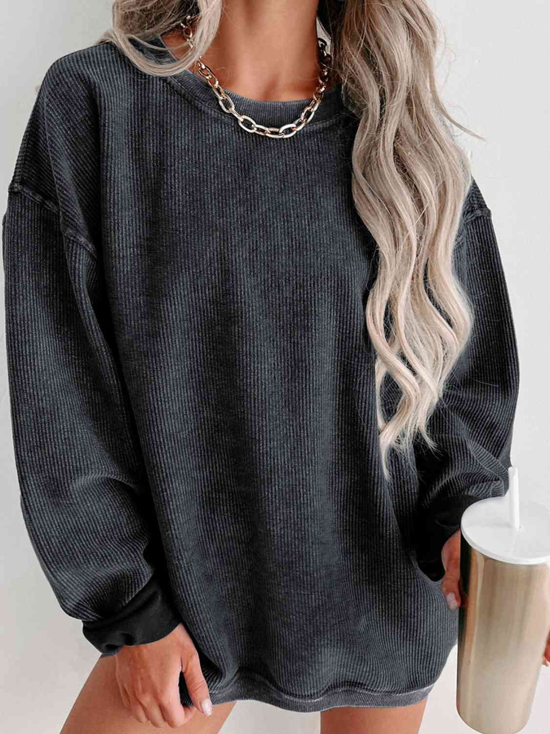 Round Neck Dropped Shoulder Sweatshirt - Premium from Trendsi - Just $39! Shop now at ZLA