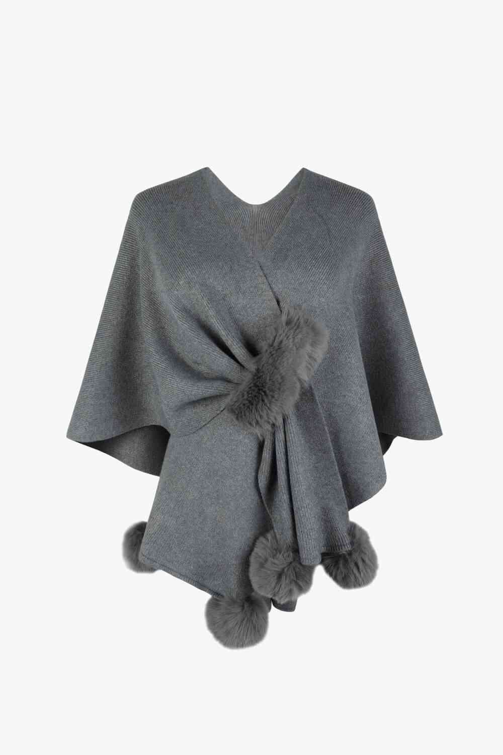 Surplice Neck Pom-Pom Trim Poncho - Premium from Trendsi - Just $43! Shop now at ZLA