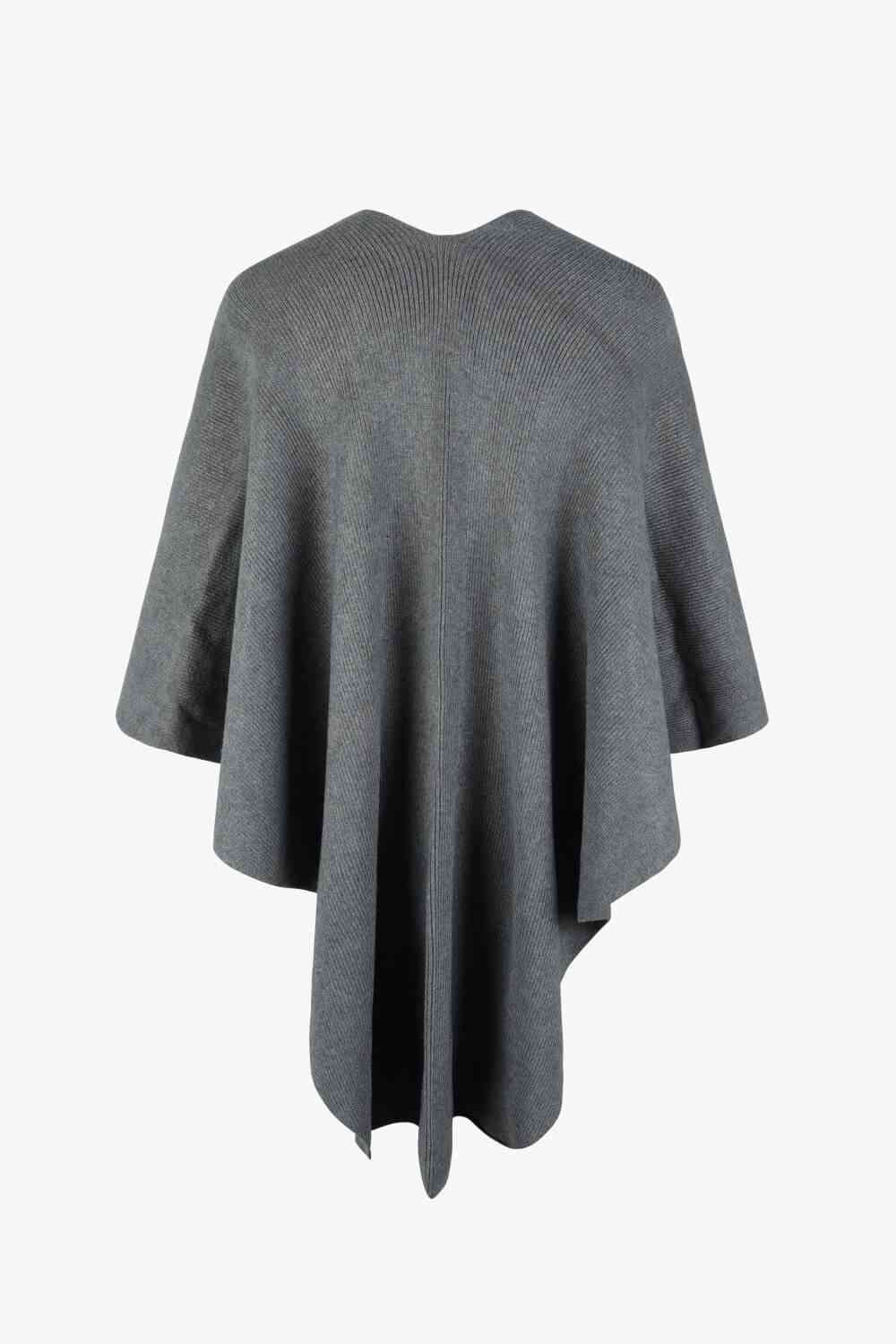 Surplice Neck Pom-Pom Trim Poncho - Premium from Trendsi - Just $43! Shop now at ZLA
