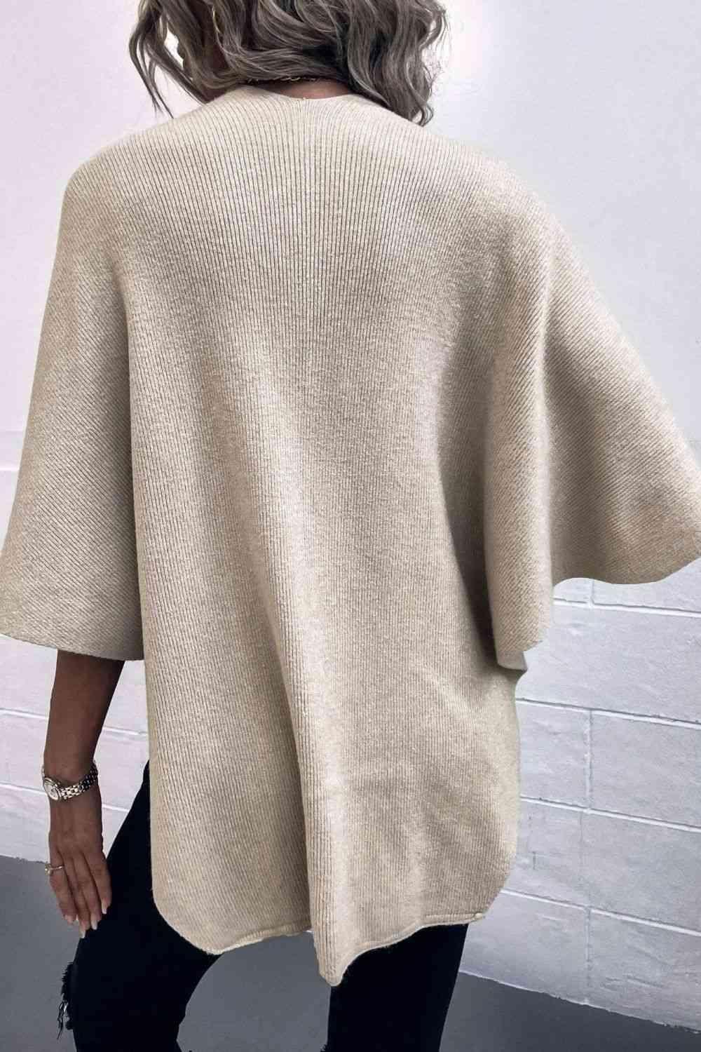 Surplice Neck Pom-Pom Trim Poncho - Premium from Trendsi - Just $43! Shop now at ZLA