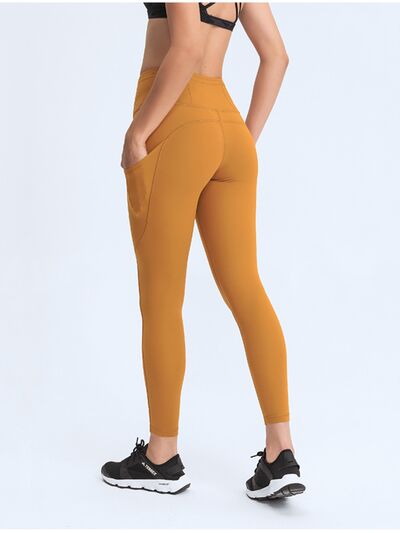Double Take Wide Waistband Leggings with Pockets - Premium  from Trendsi - Just $38! Shop now at ZLA